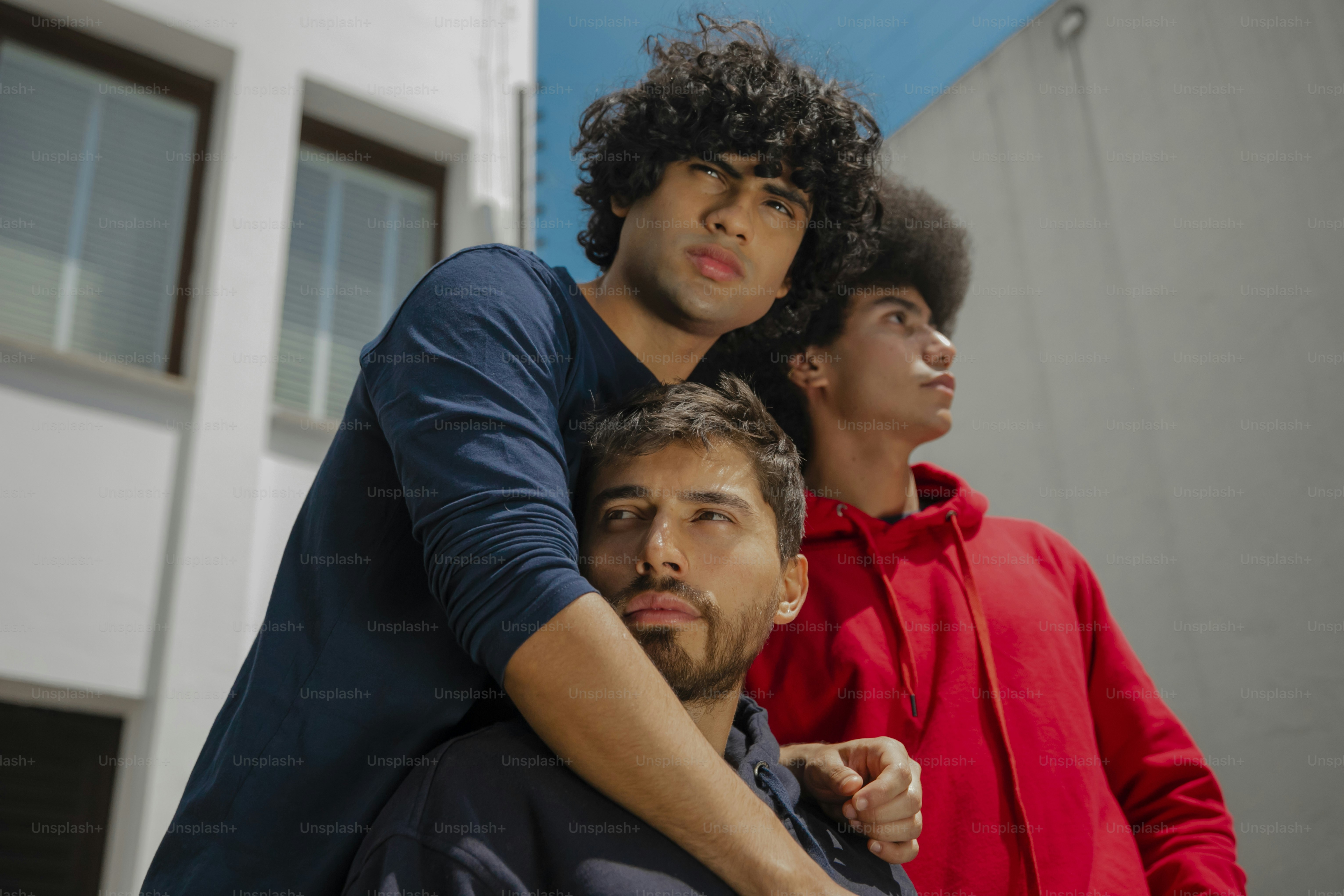 a couple of men standing next to each other