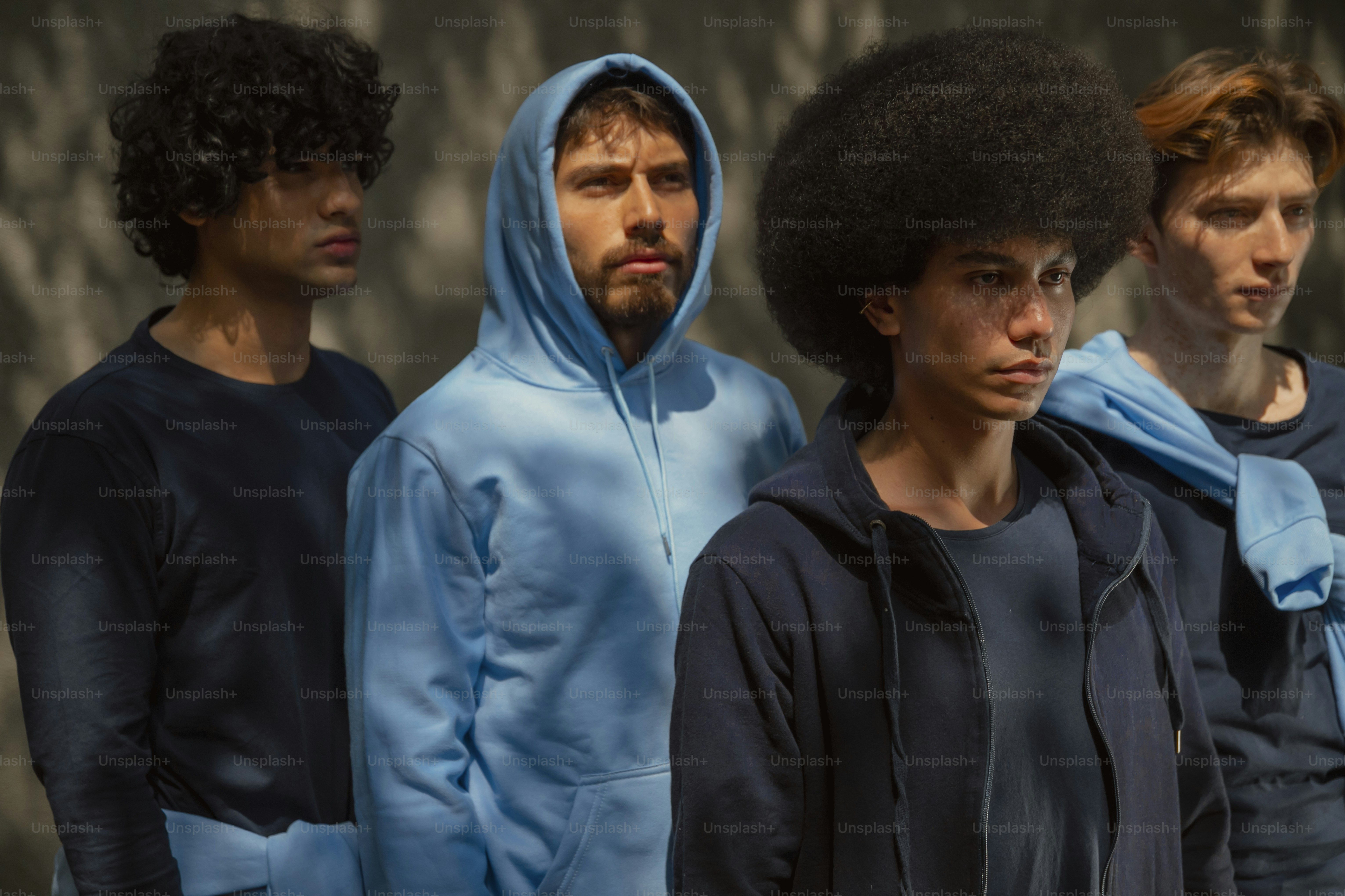 a group of men standing next to each other