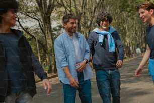 a group of young men walking down a street