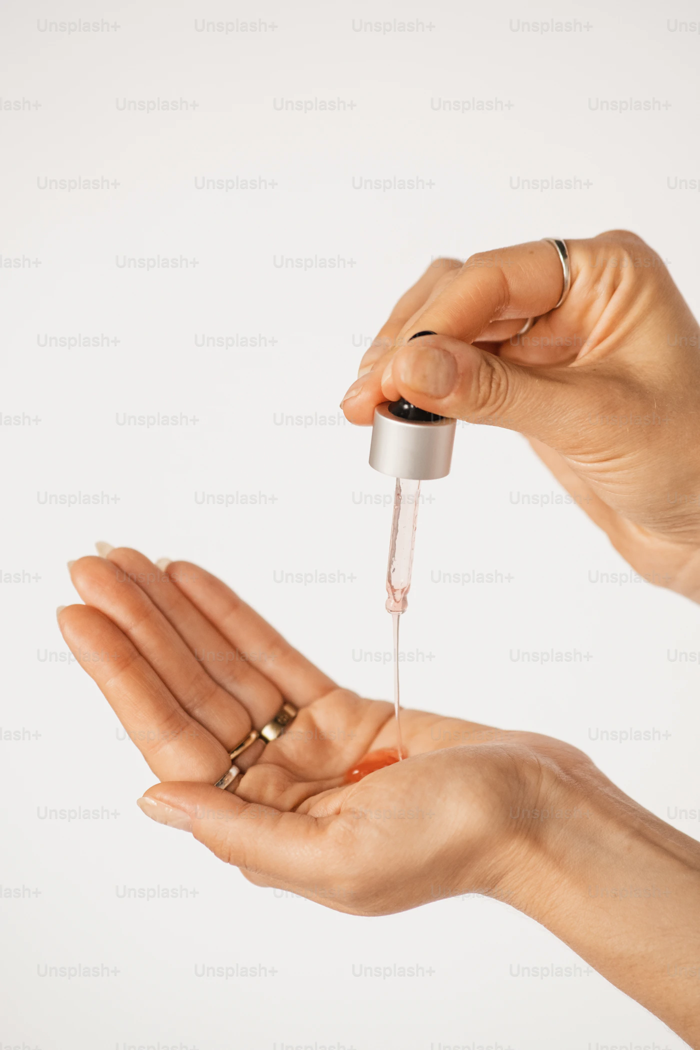 Hands holding wellness bottle