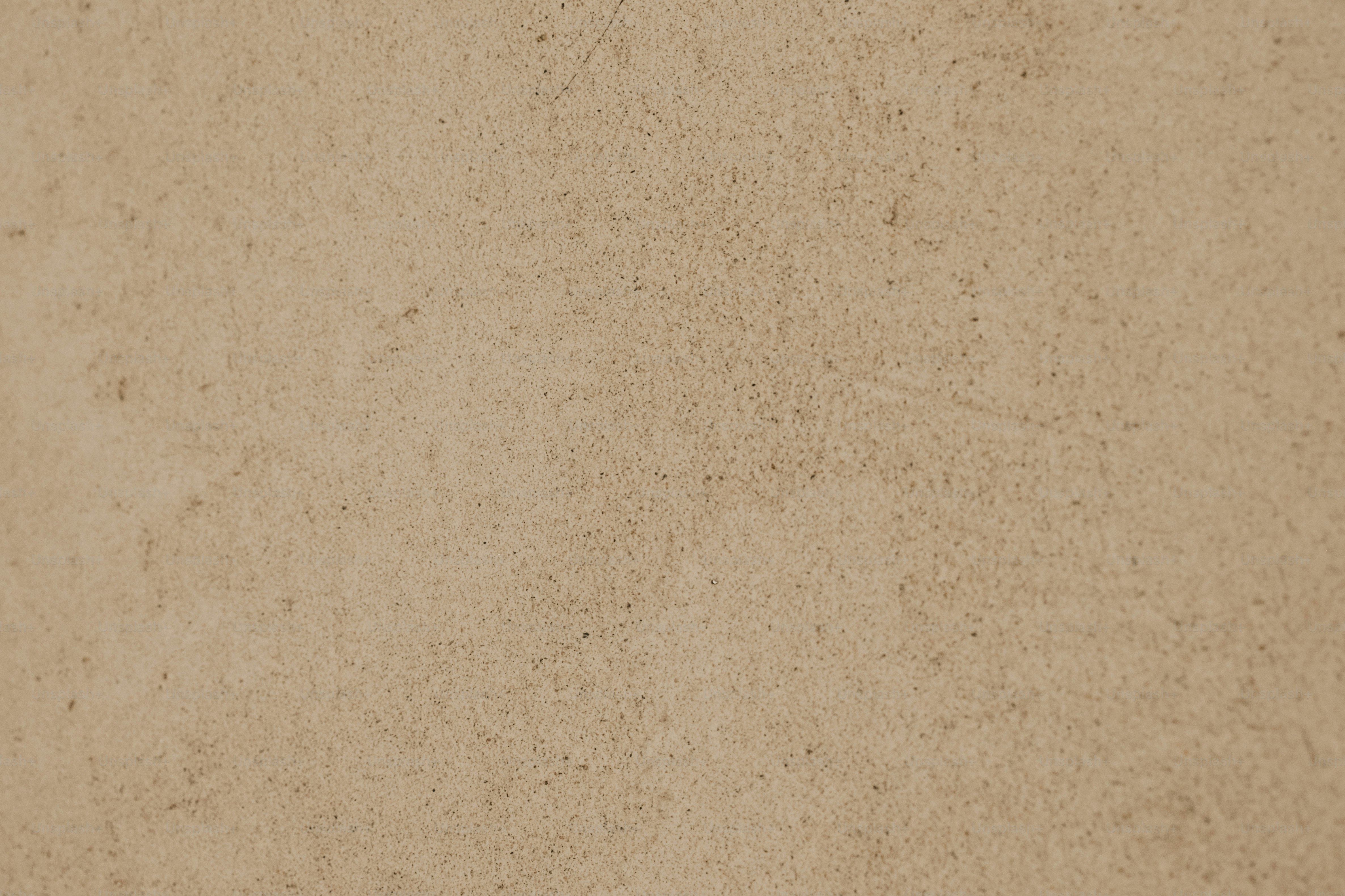 a close up view of a tan colored surface