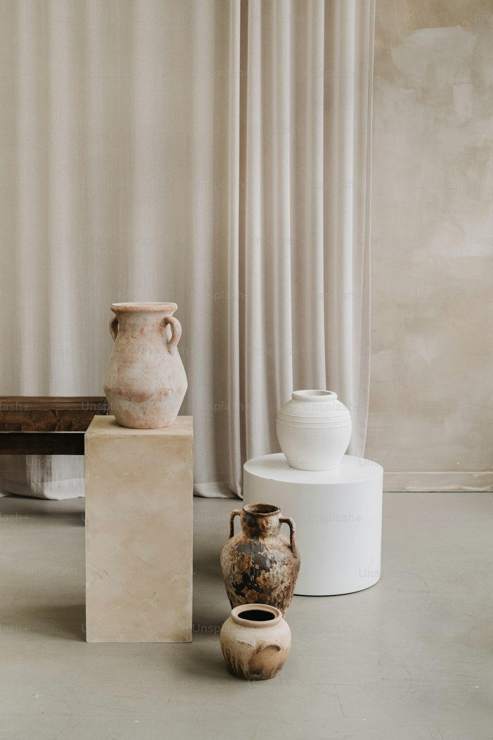 a couple of vases sitting next to each other