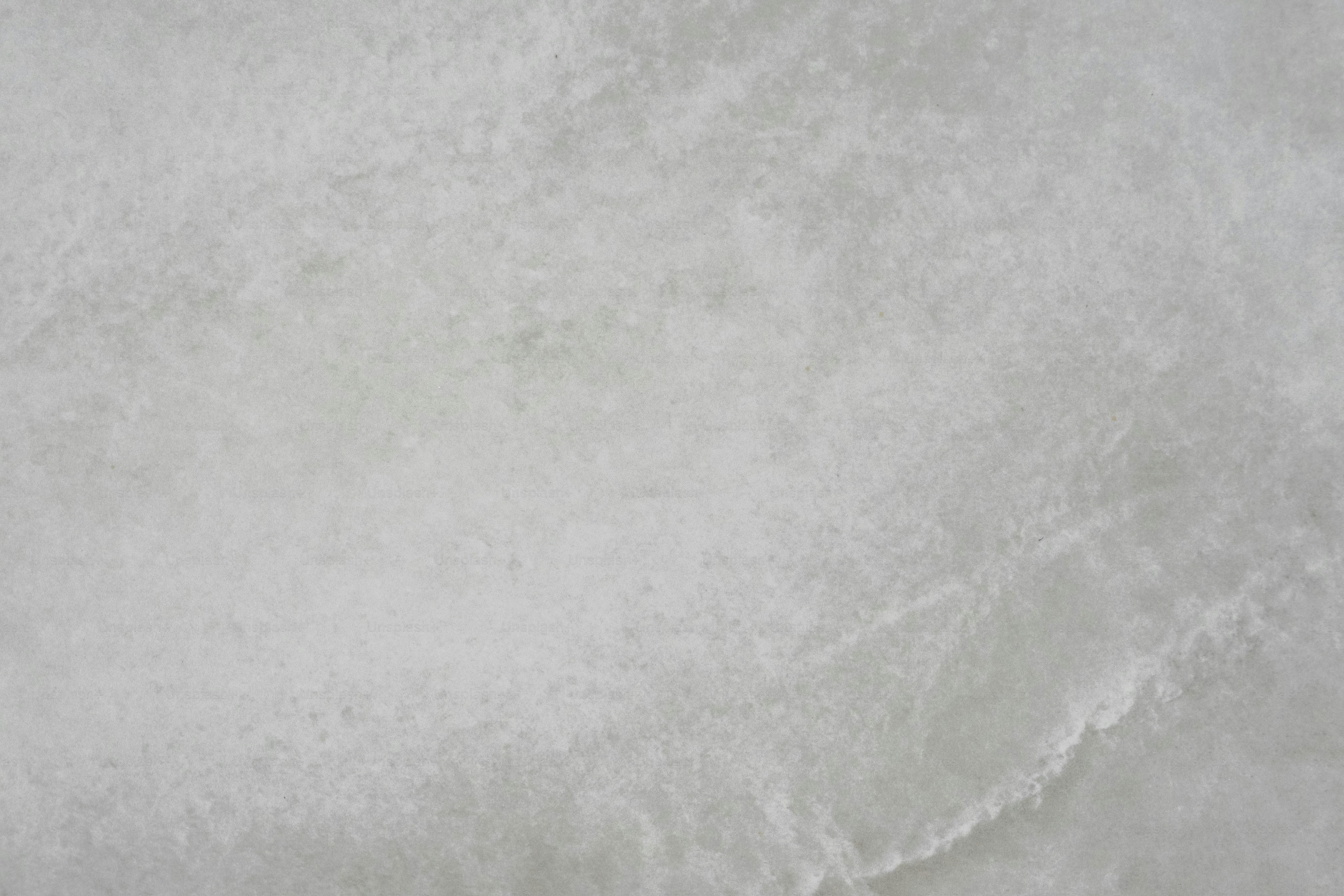 a close up of a snow covered ground