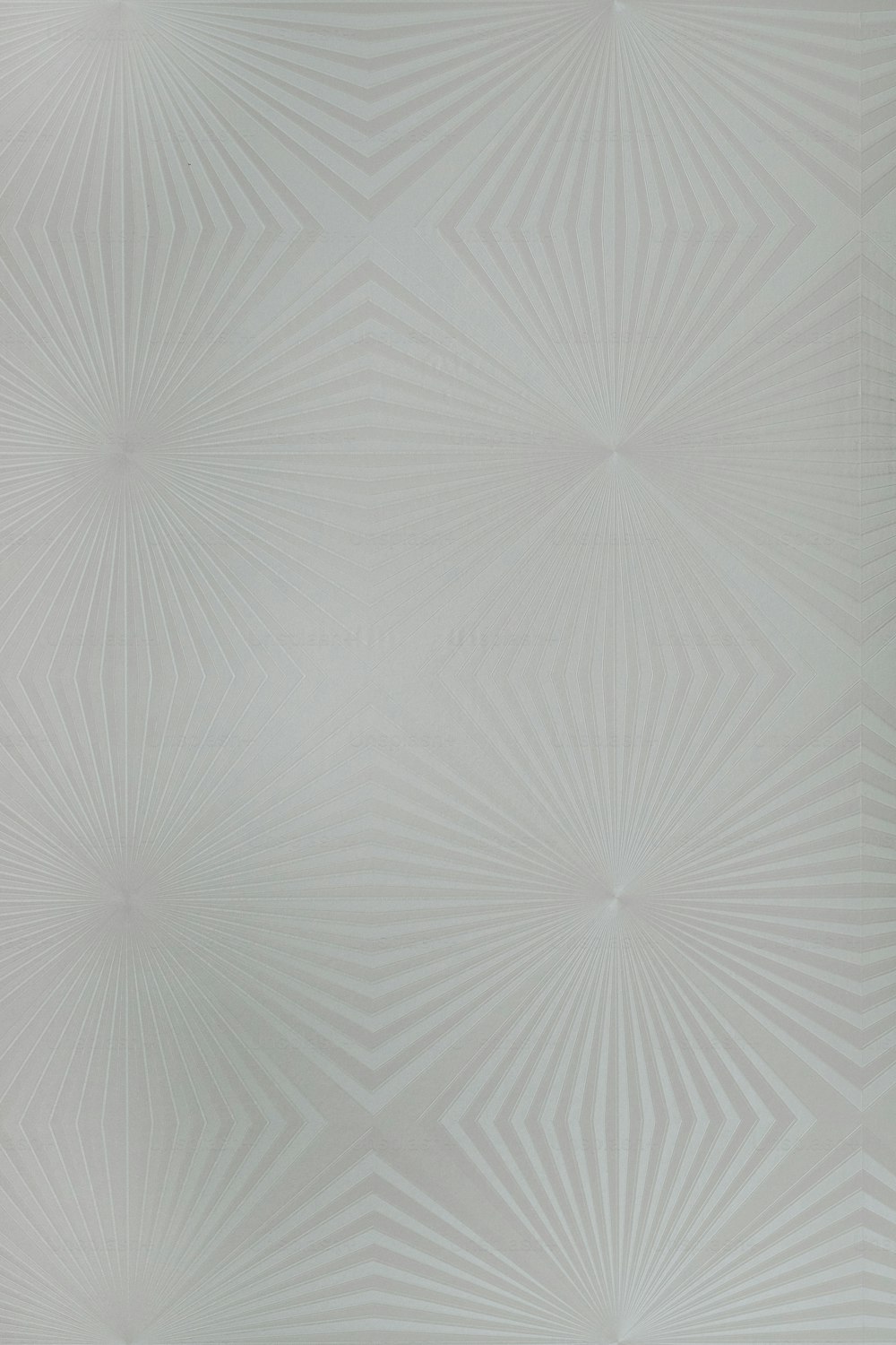 una pared blanca con un patrón