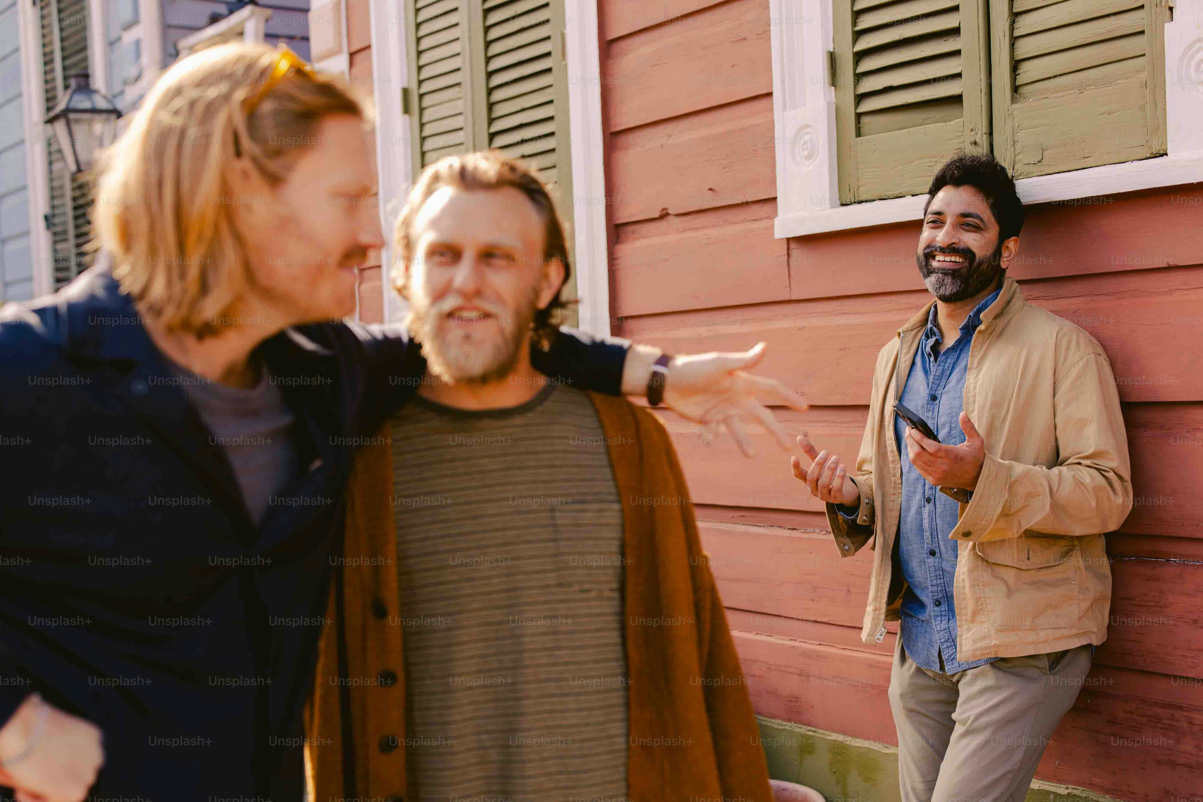 a couple of men standing next to each other