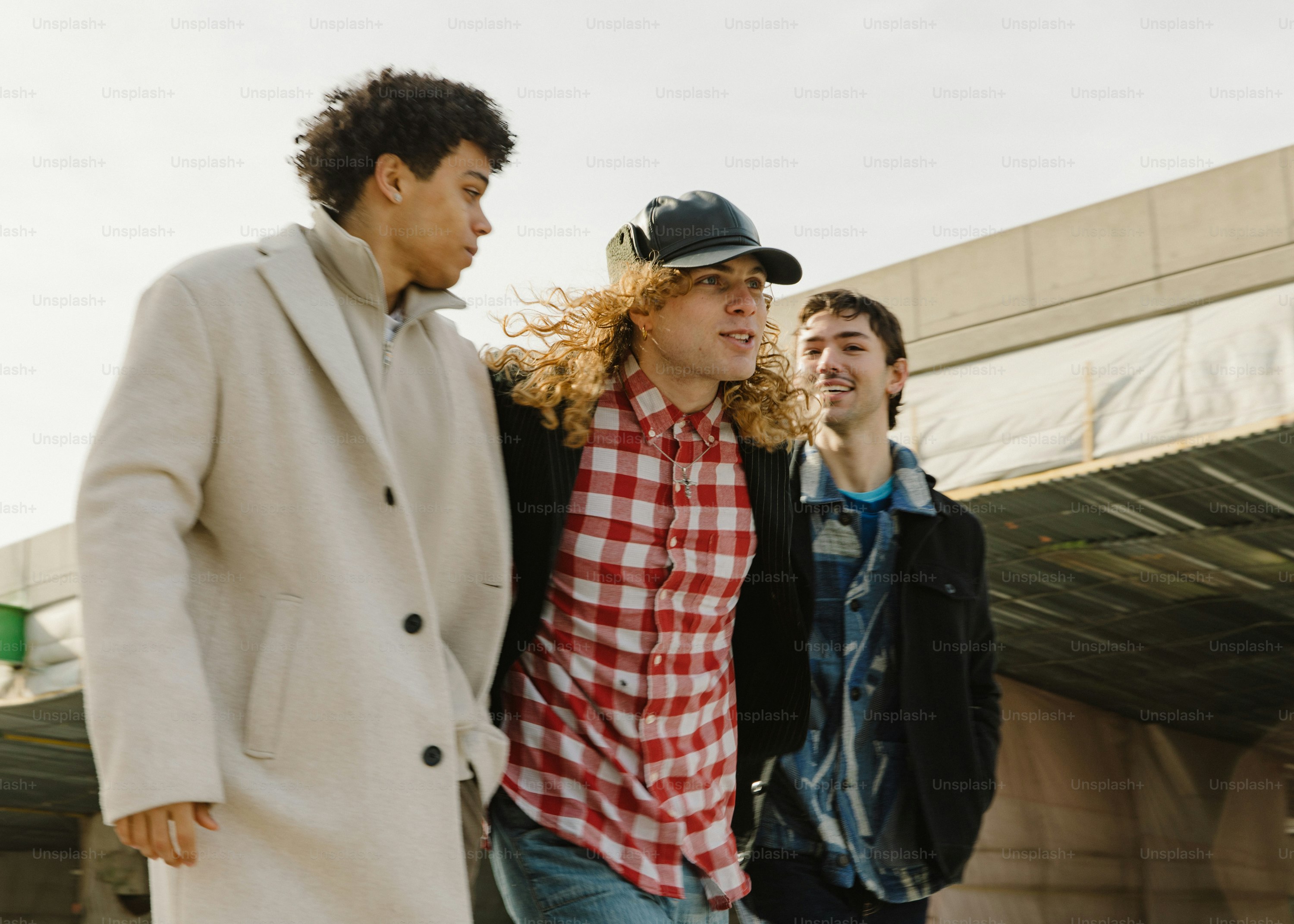 a group of young men standing next to each other