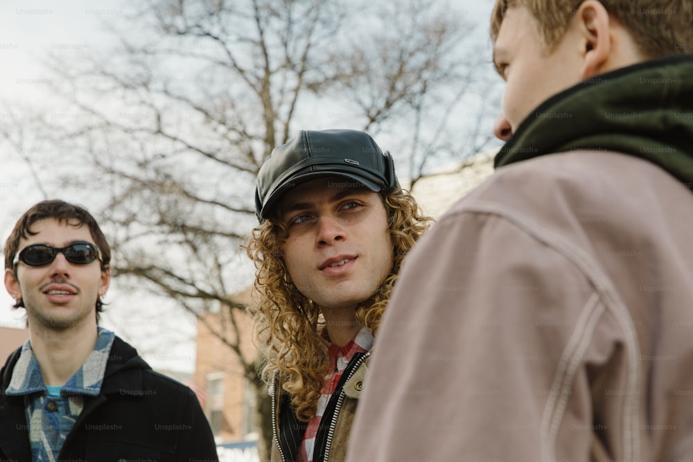 a group of young men standing next to each other