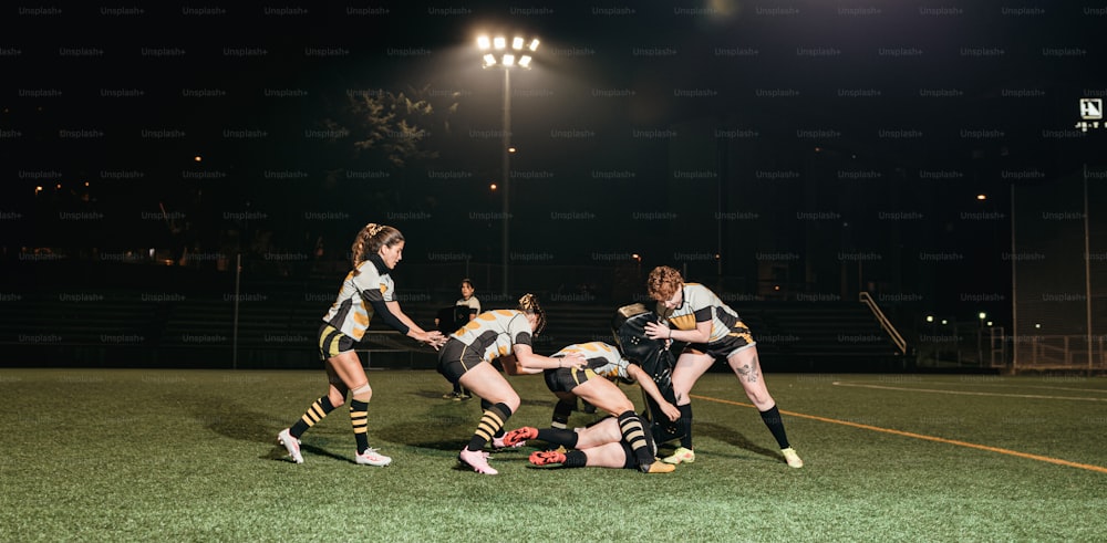 a group of young women playing a game of soccer