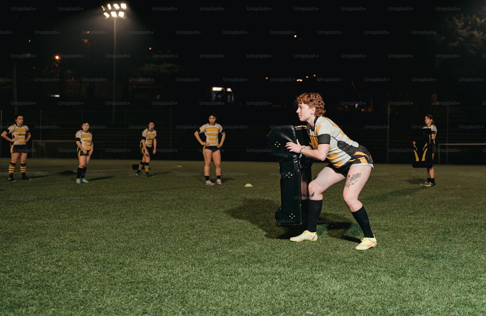 a group of young men playing a game of soccer