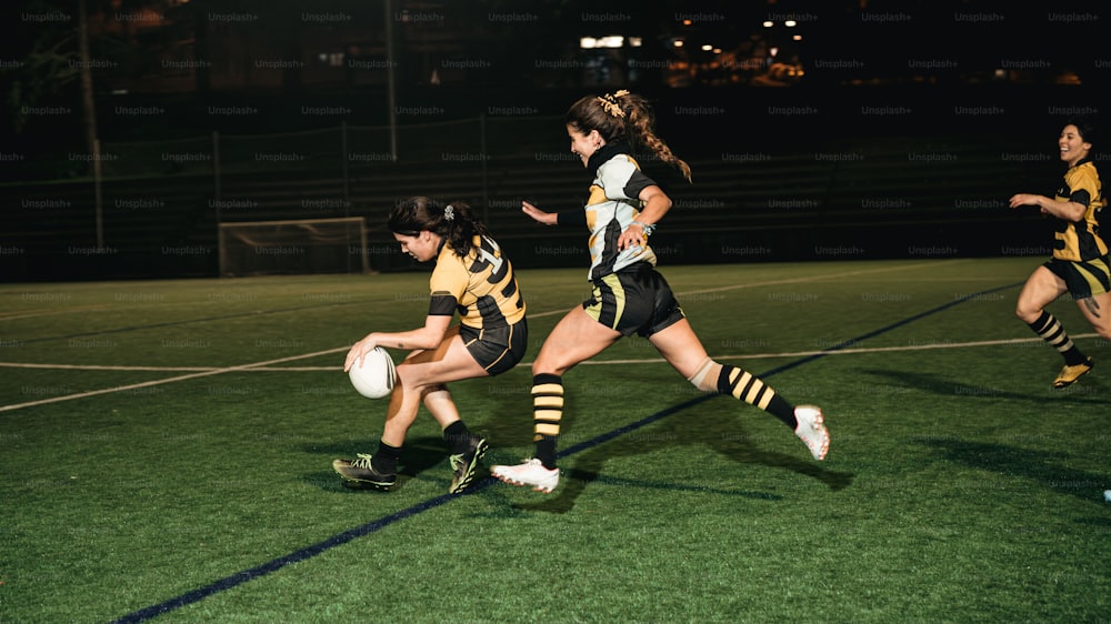 a group of young women playing a game of soccer