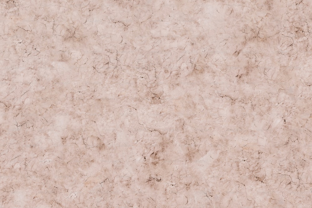 Un primo piano di una texture in marmo beige
