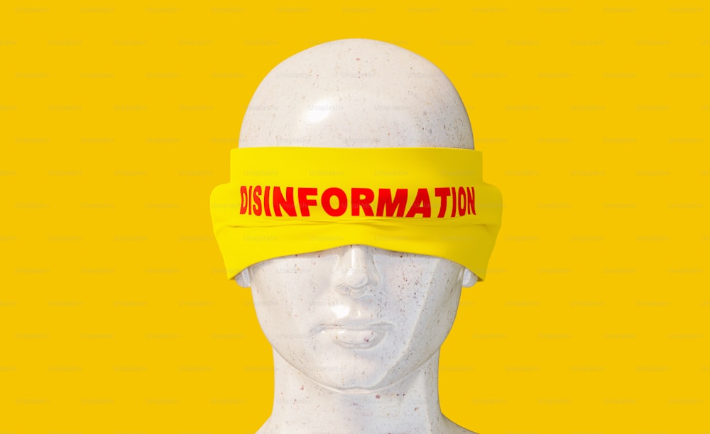 a white mannequin head with a yellow headband with the word information taped