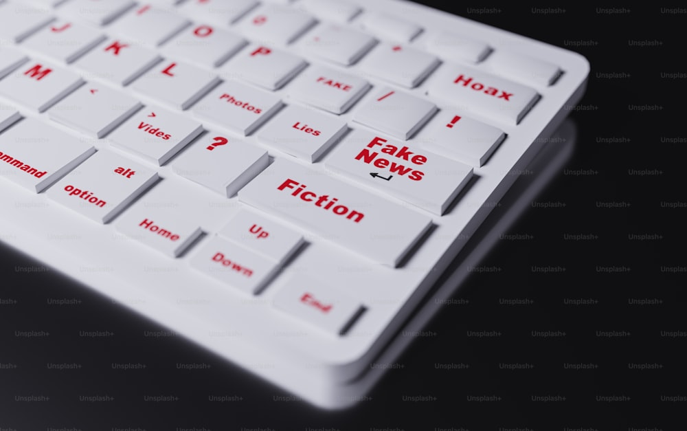 a close up of a white keyboard with red letters