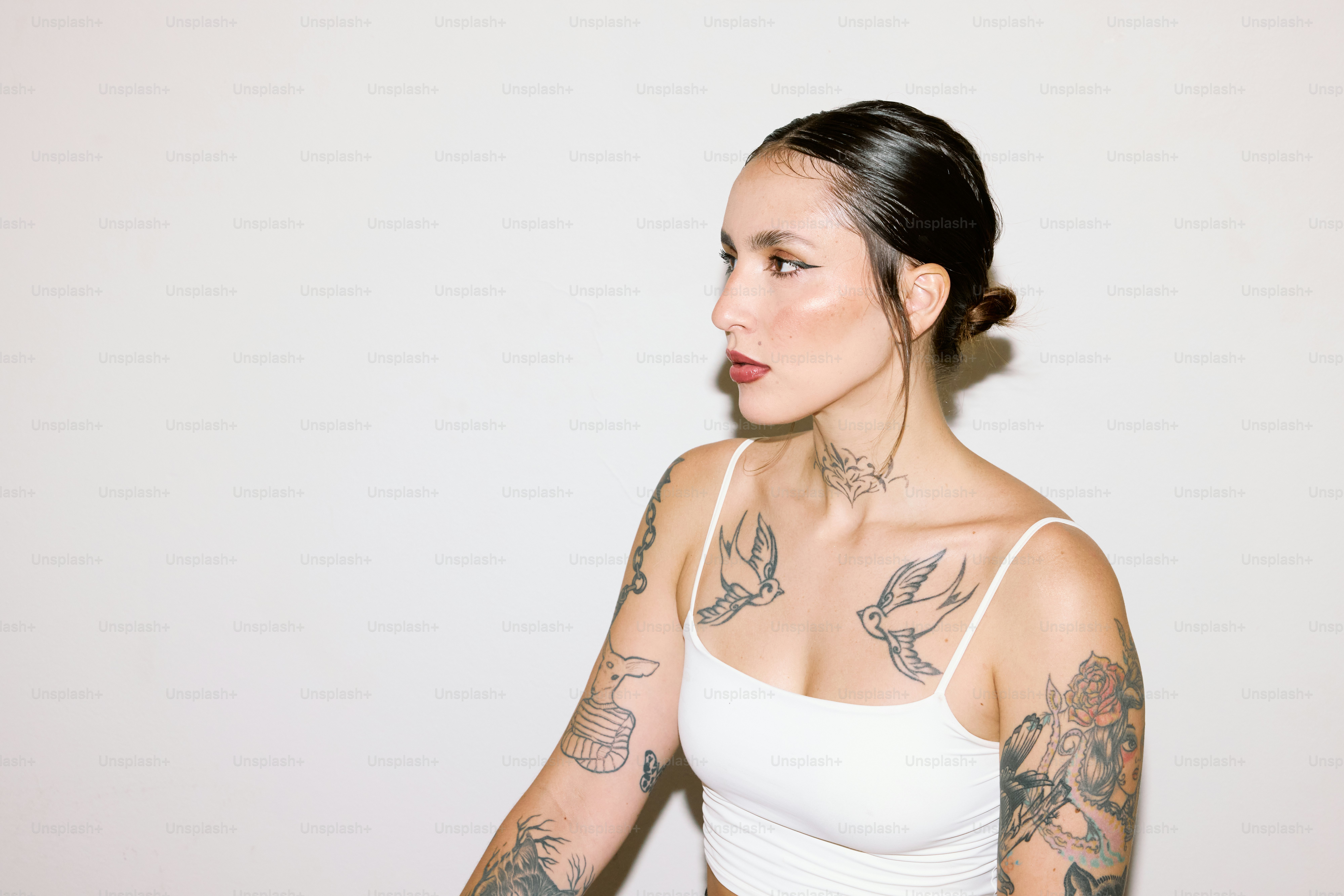 a woman with a tattoo on her arm