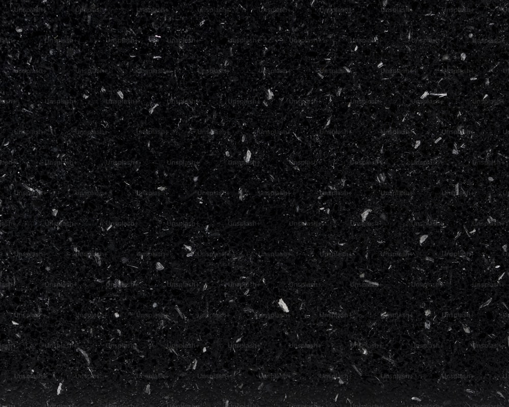 a black and white photo of snow flakes