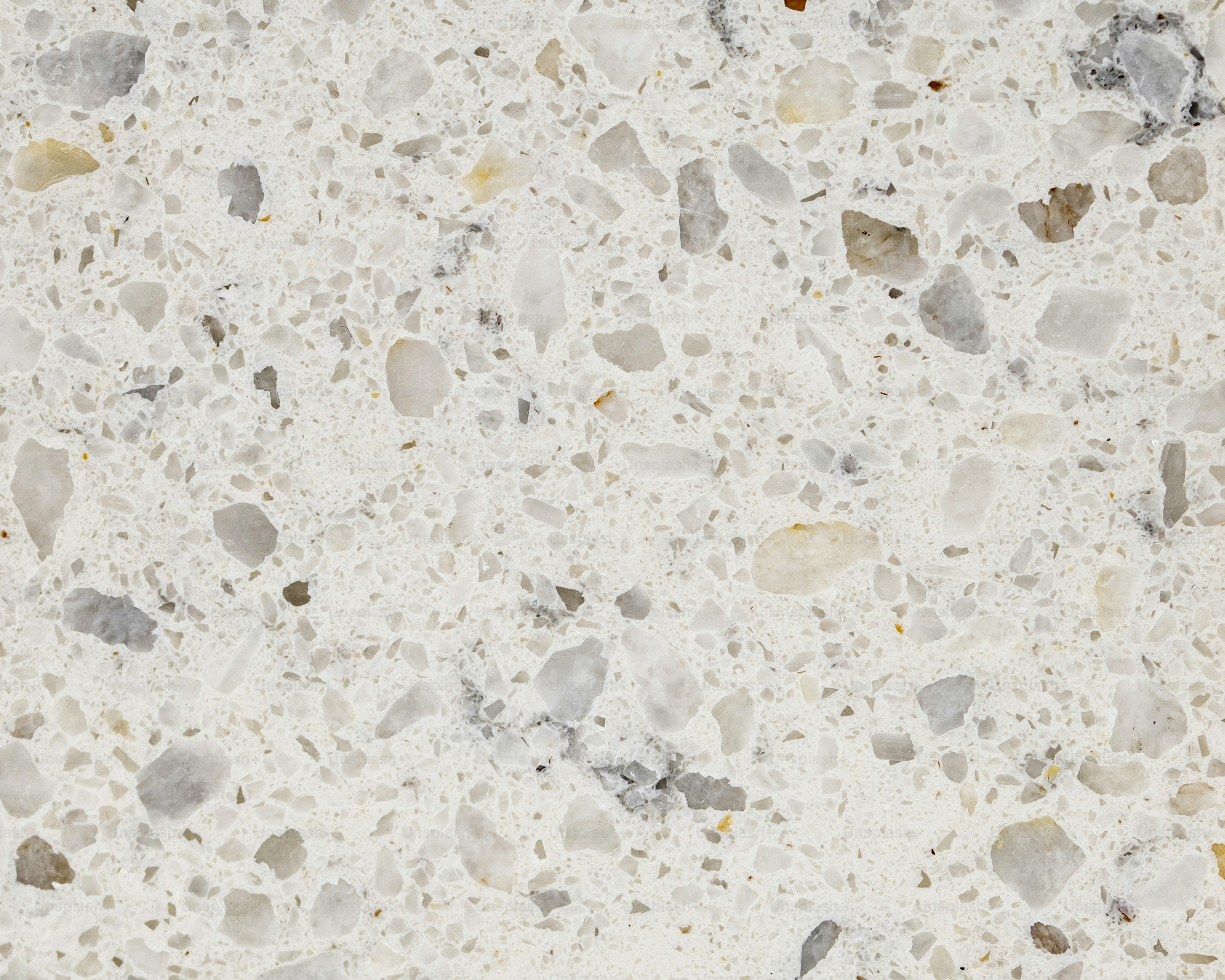 A close up of a marble surface with small rocks photo – Texture Image ...
