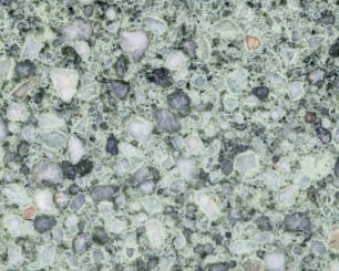 a close up of a green marble surface