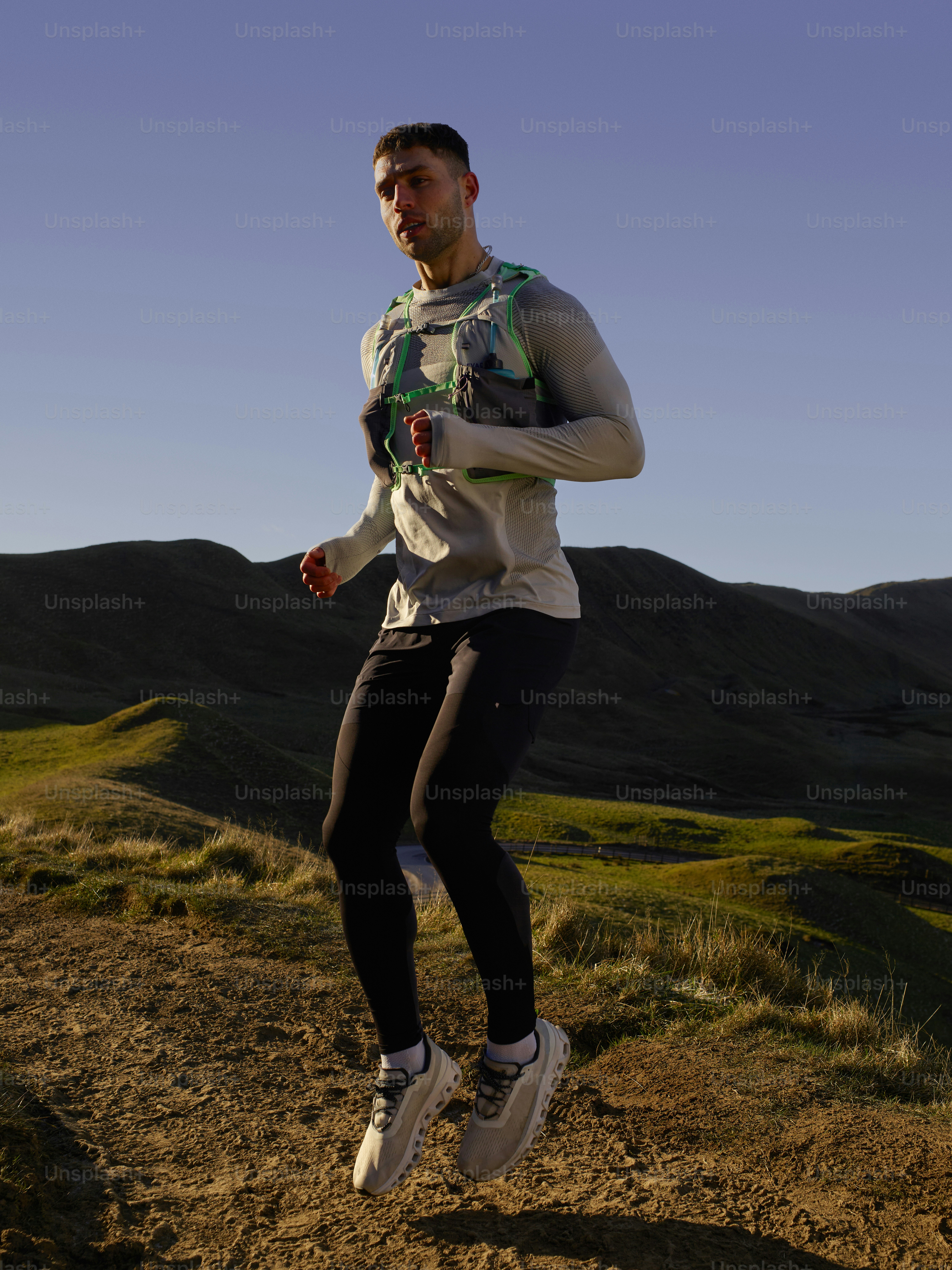 Marathon runner preparing electrolyte balance hydration gear before race