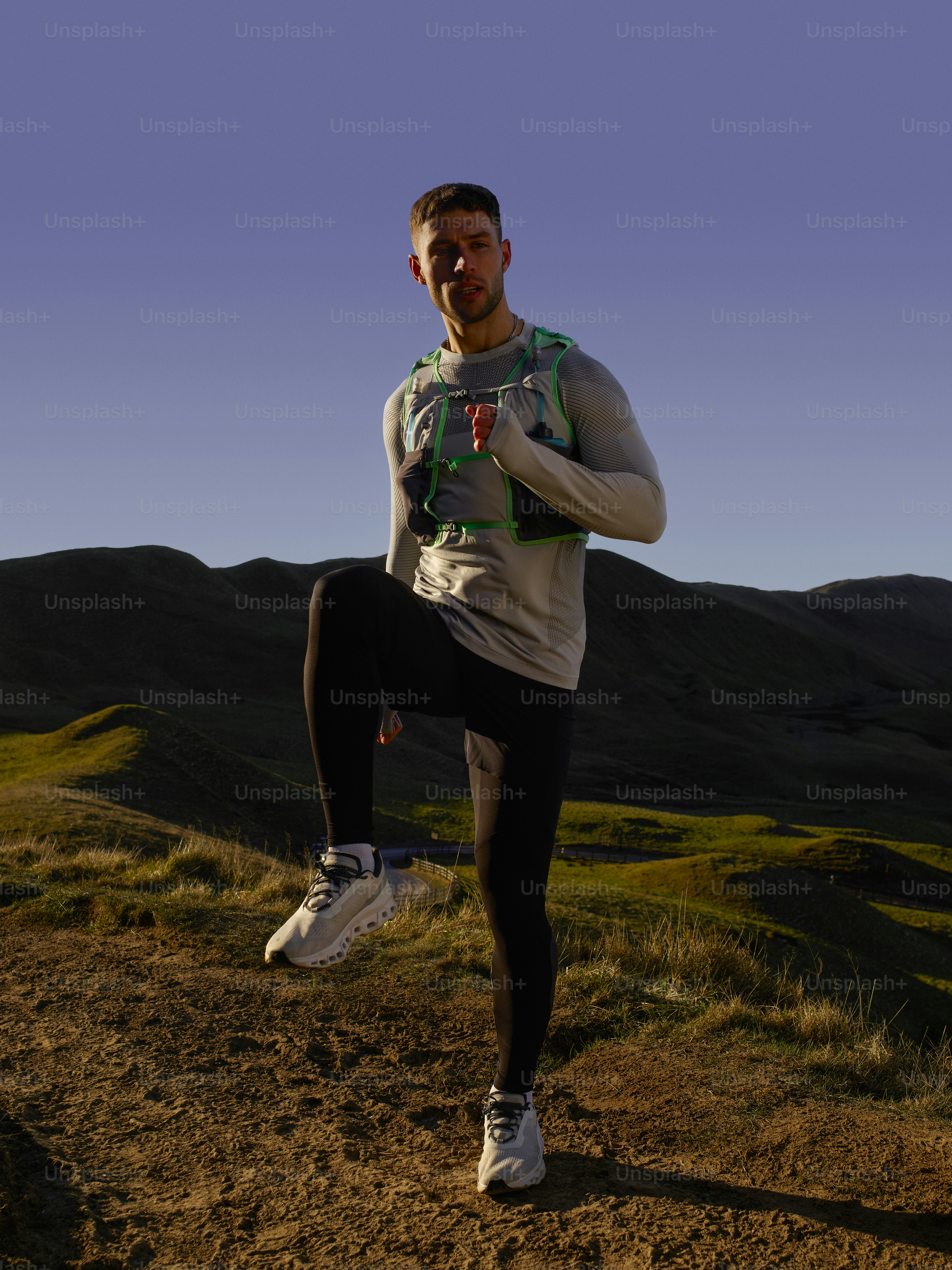 Runner performing runner knee exercises to reduce knee pain during marathon training