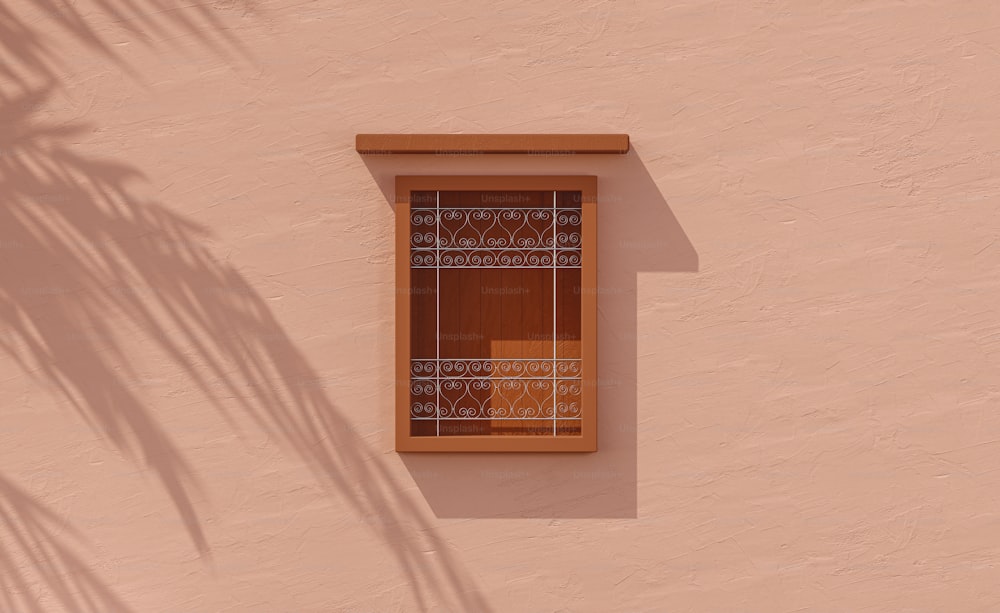 uma sombra de uma palmeira em uma parede rosa