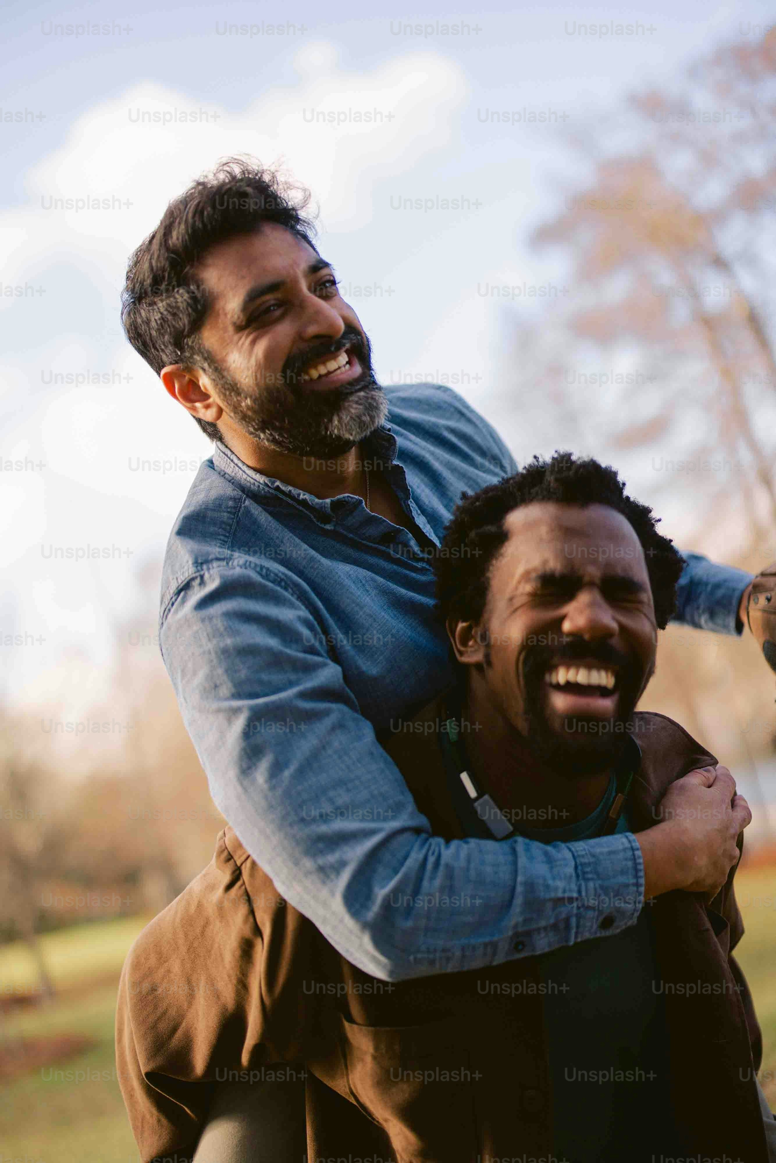 a man carrying another man on his back