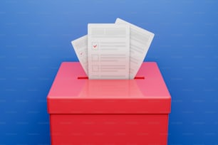 una caja roja con una pila de papeles encima