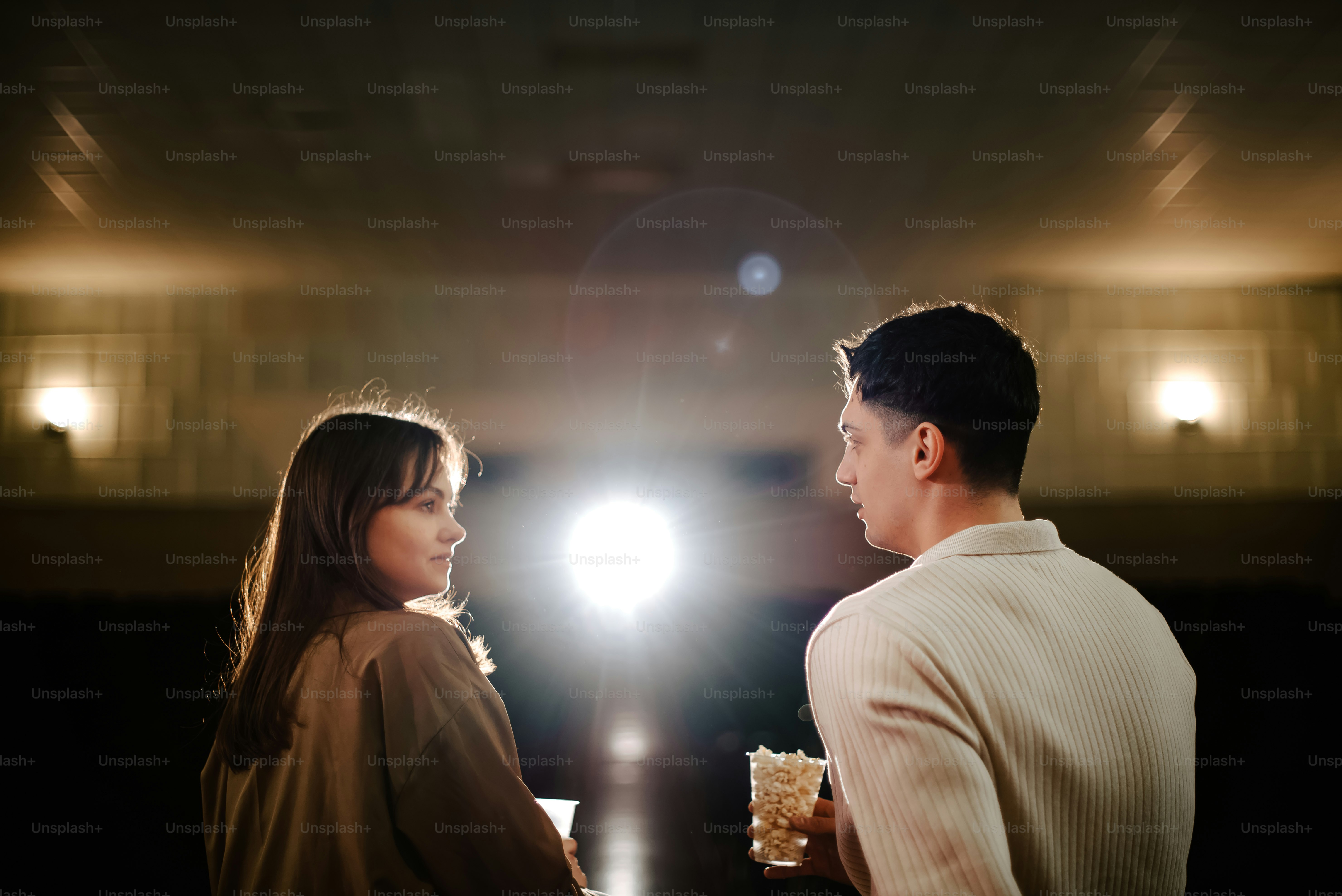 a man and a woman standing next to each other