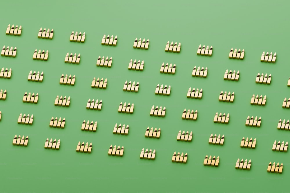 a green background with rows of small white candles