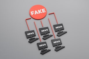 a red fake news sign hanging from the side of a wall