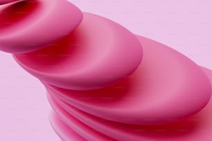 a pink background with a very large object in the middle of it