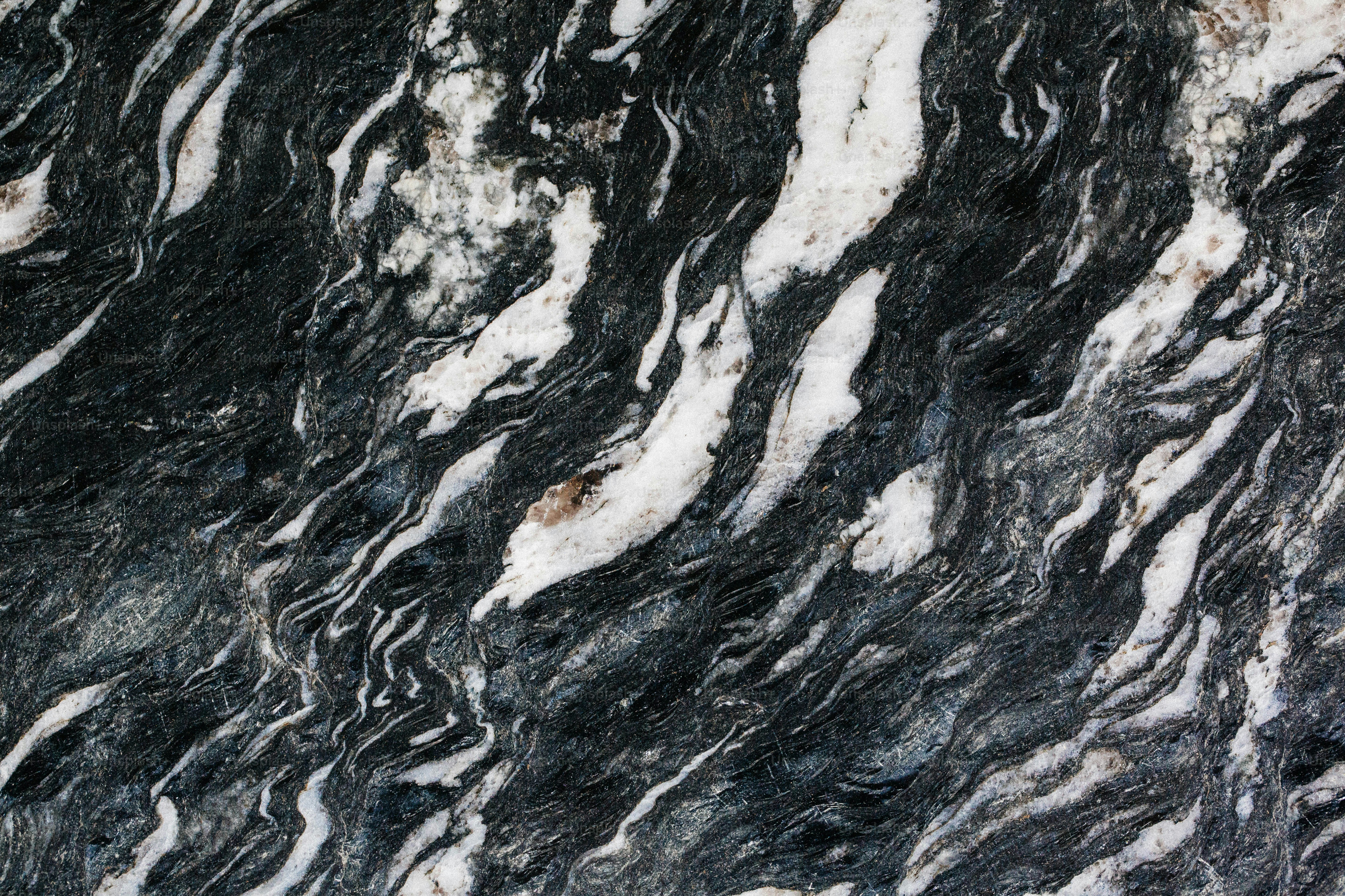 a black and white marble textured wall
