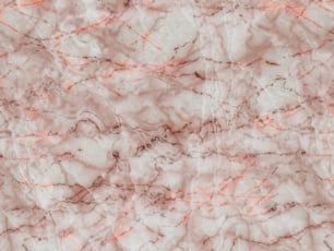 a close up of a marble surface with orange streaks