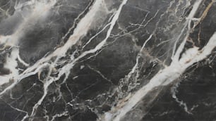 a close up of a black and white marble surface