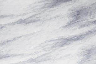 ein strukturierter Hintergrund aus weißem und grauem Marmor