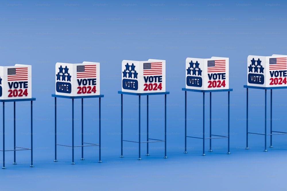 a row of voting signs with the american flag on them
