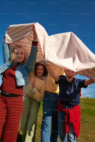 a group of people carrying a large object over their heads