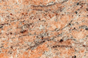 a close up of a marble surface that looks like granite