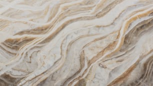 a close up of a marbled surface with brown and white colors