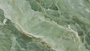 a close up of a green marble surface