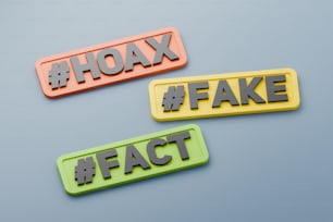 three different colored hash stickers with the words fax and fax on them