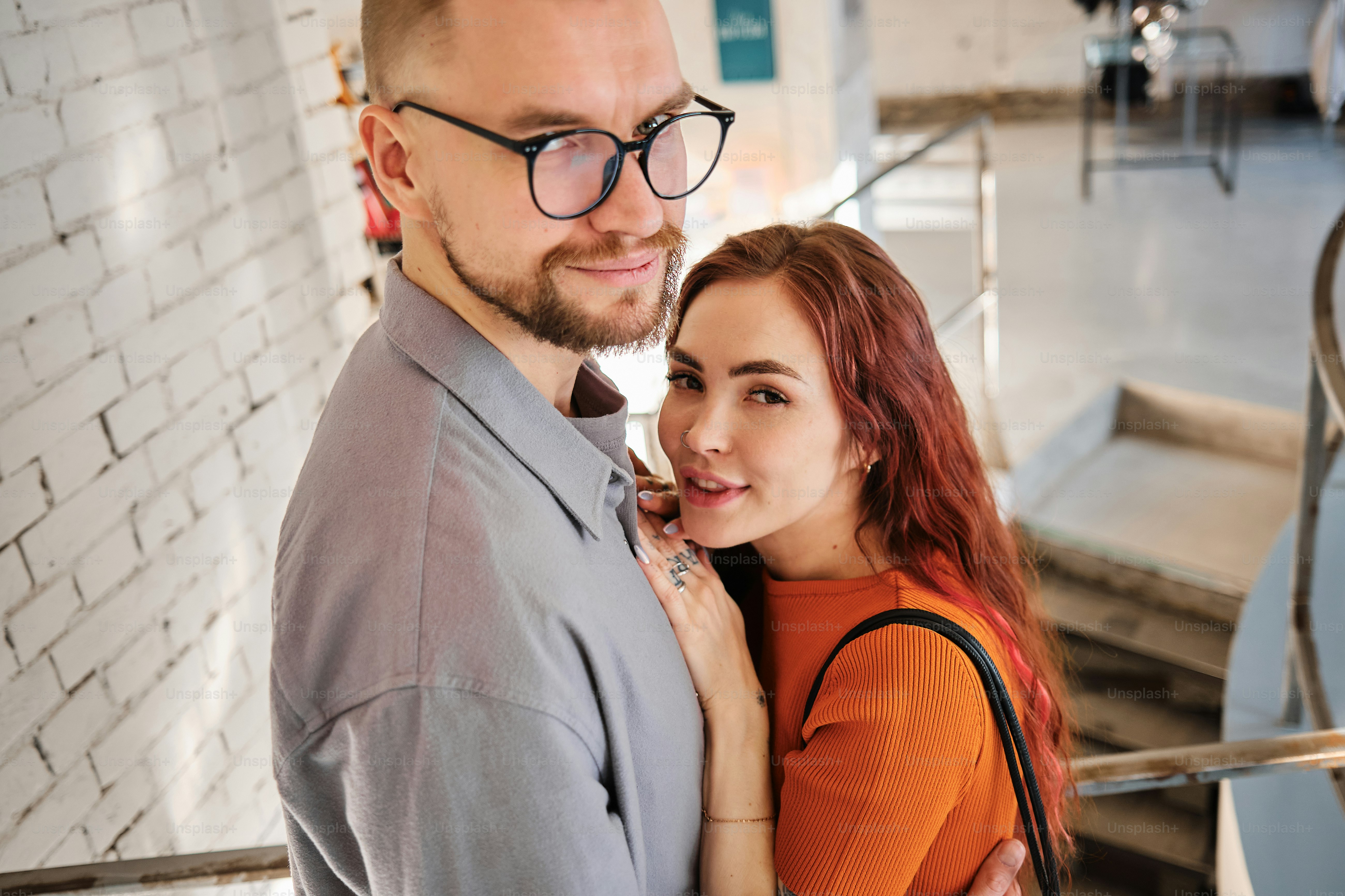 a man and a woman standing next to each other