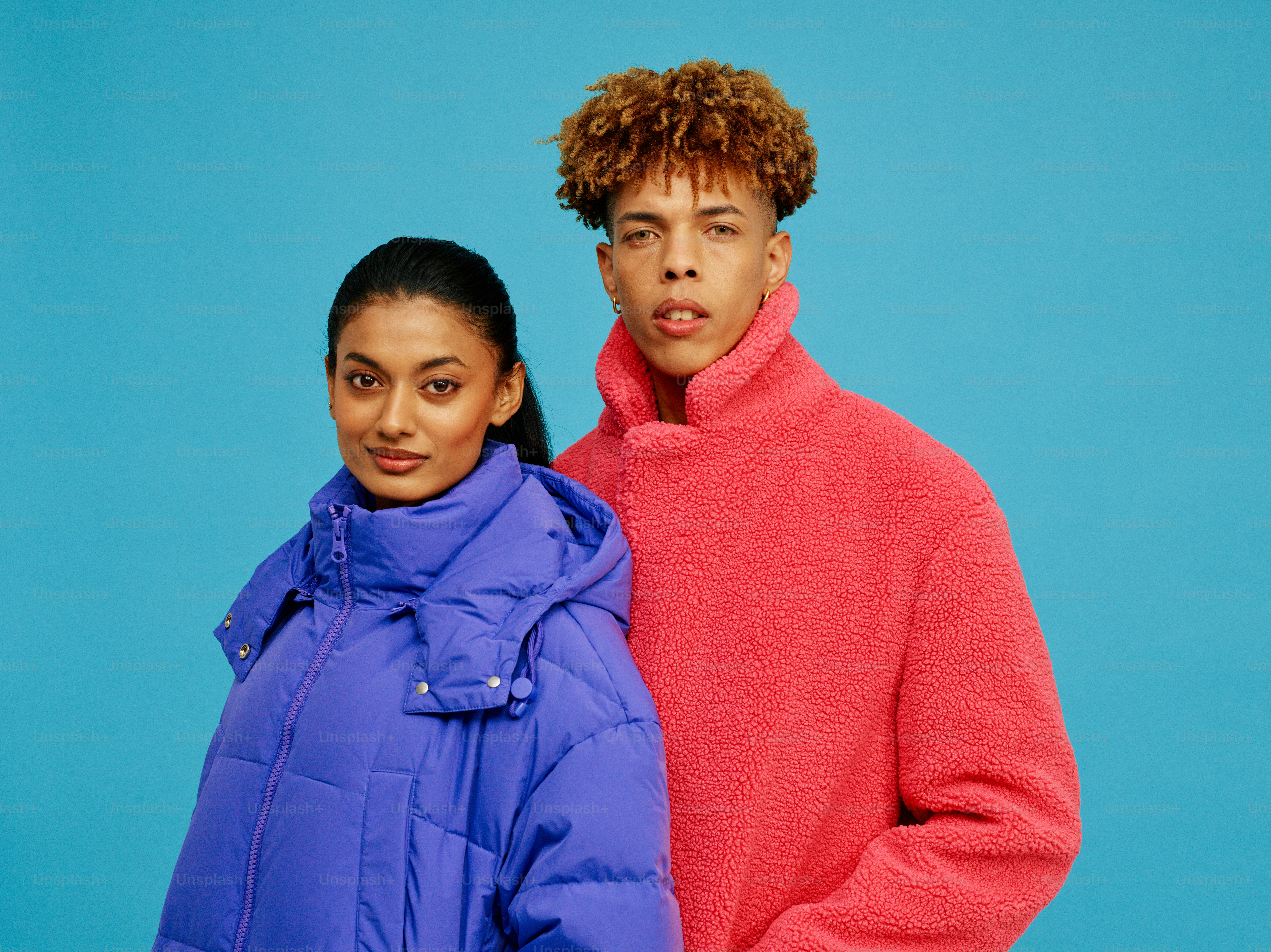 a couple of people standing next to each other