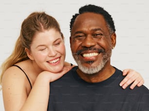 a man and a woman posing for a picture