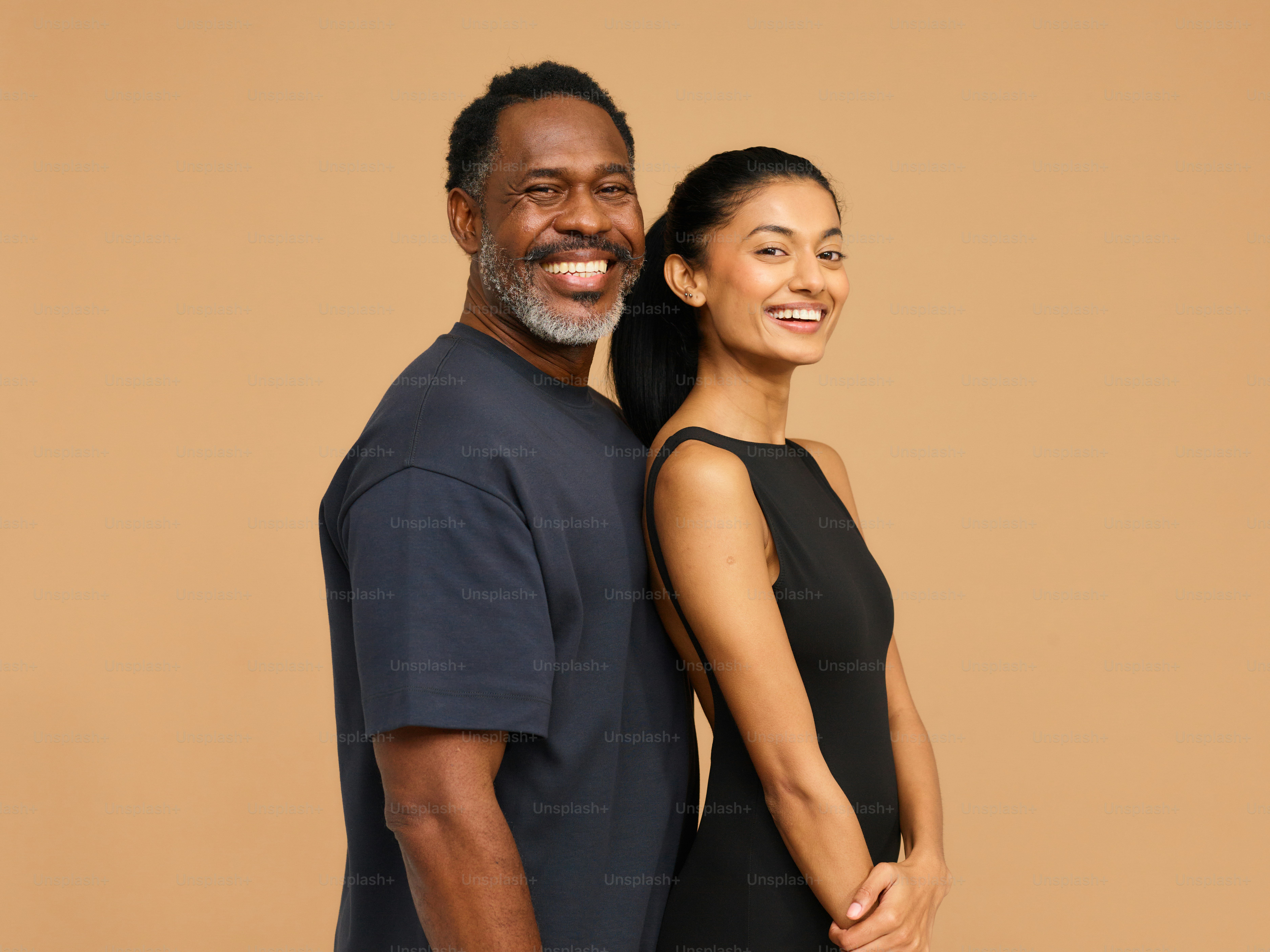 a man and a woman standing next to each other