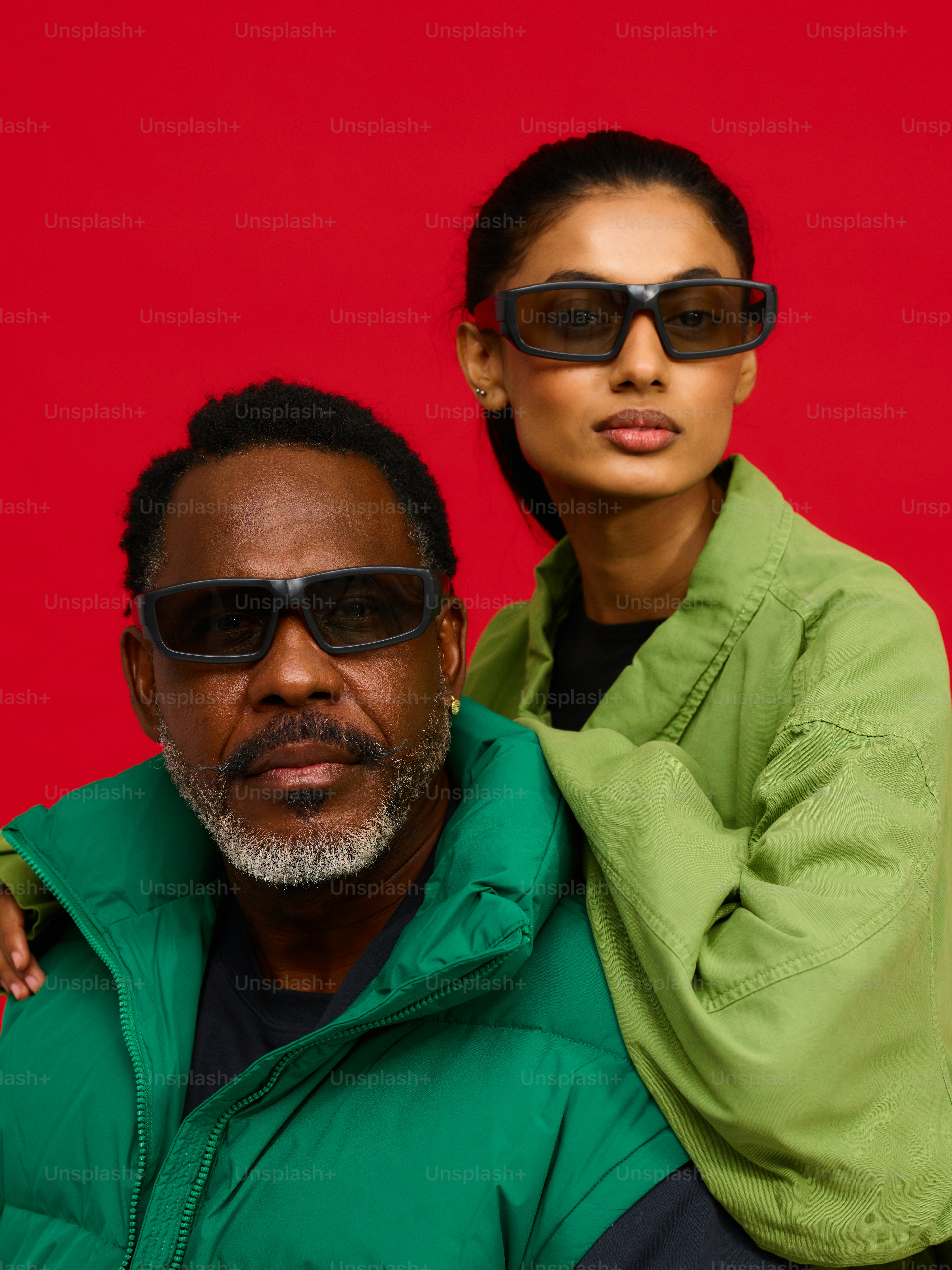 a man and a woman are posing for a picture