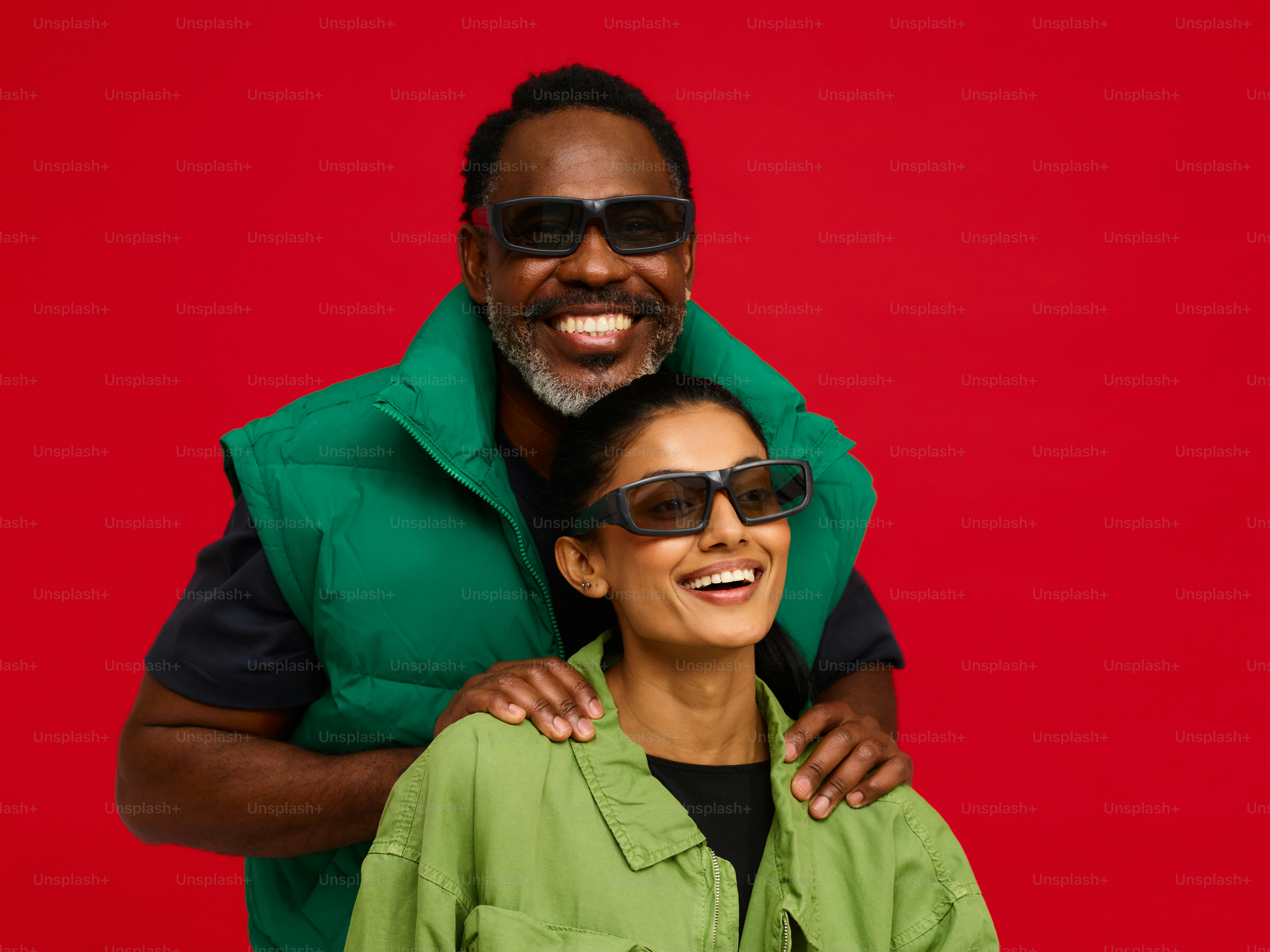 a man in a green jacket and a woman in a green jacket