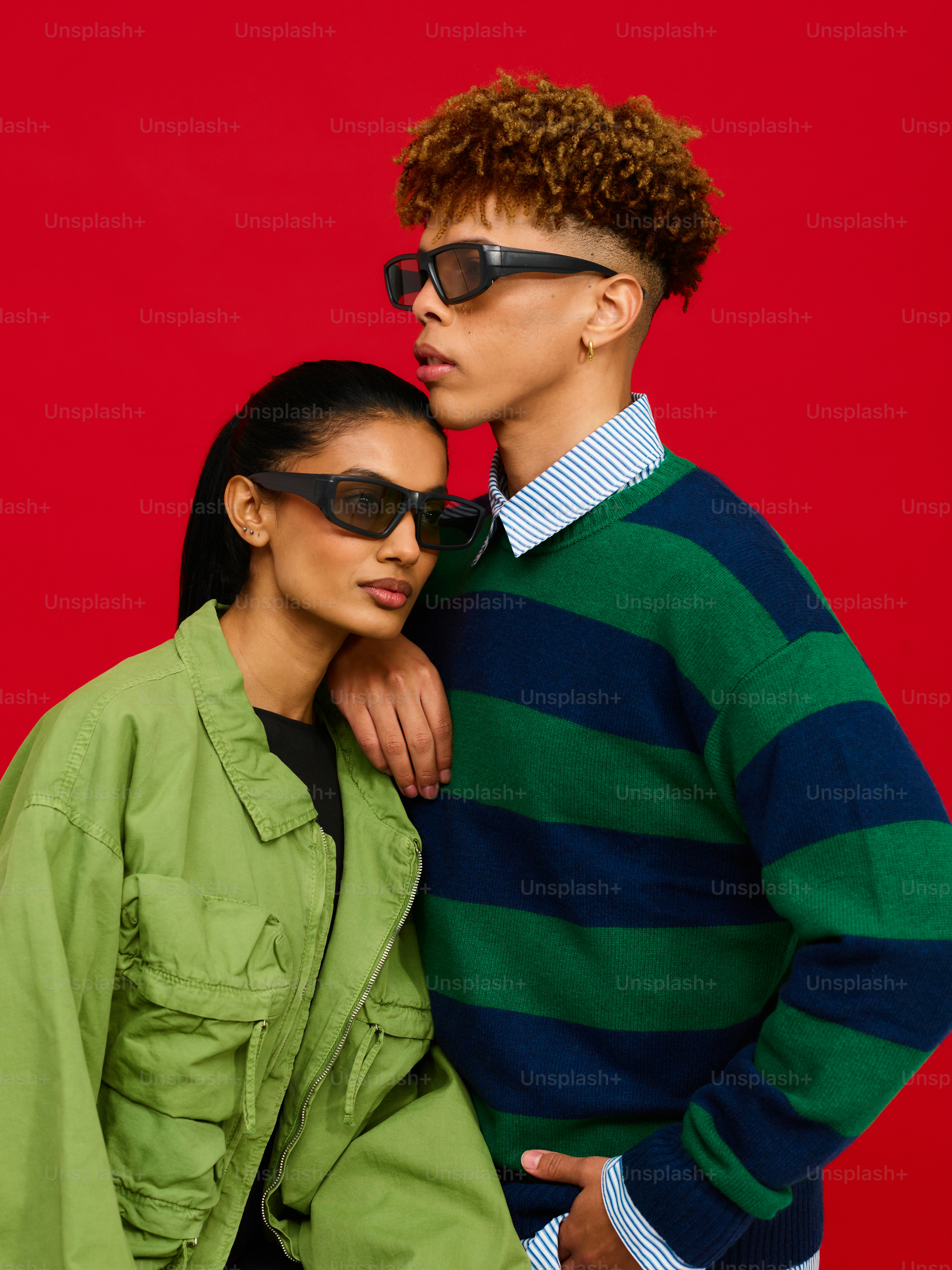 A man and a woman standing next to each other photo – Couple Image on ...