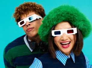 a man and a woman wearing 3d glasses