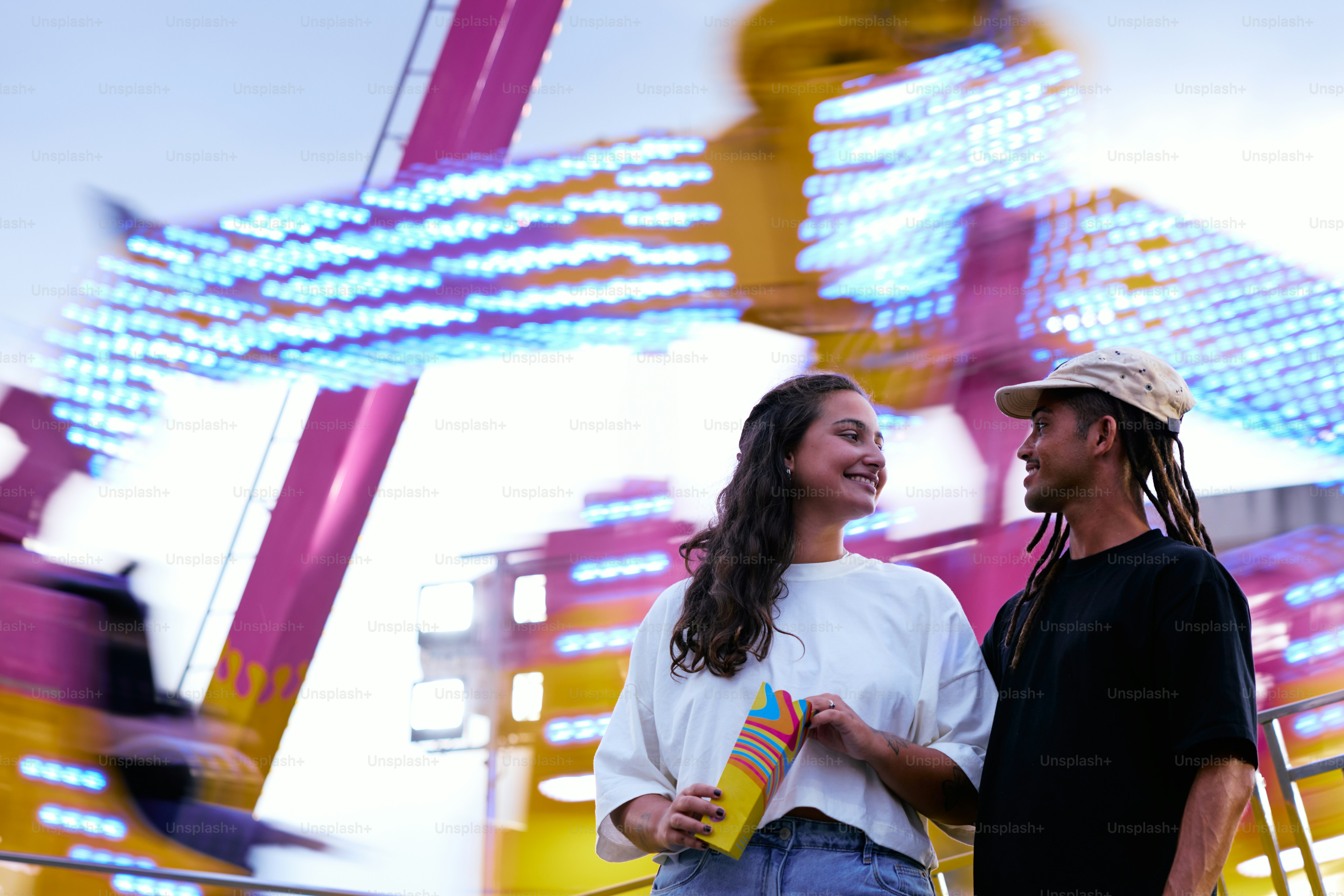 a man and a woman standing next to each other