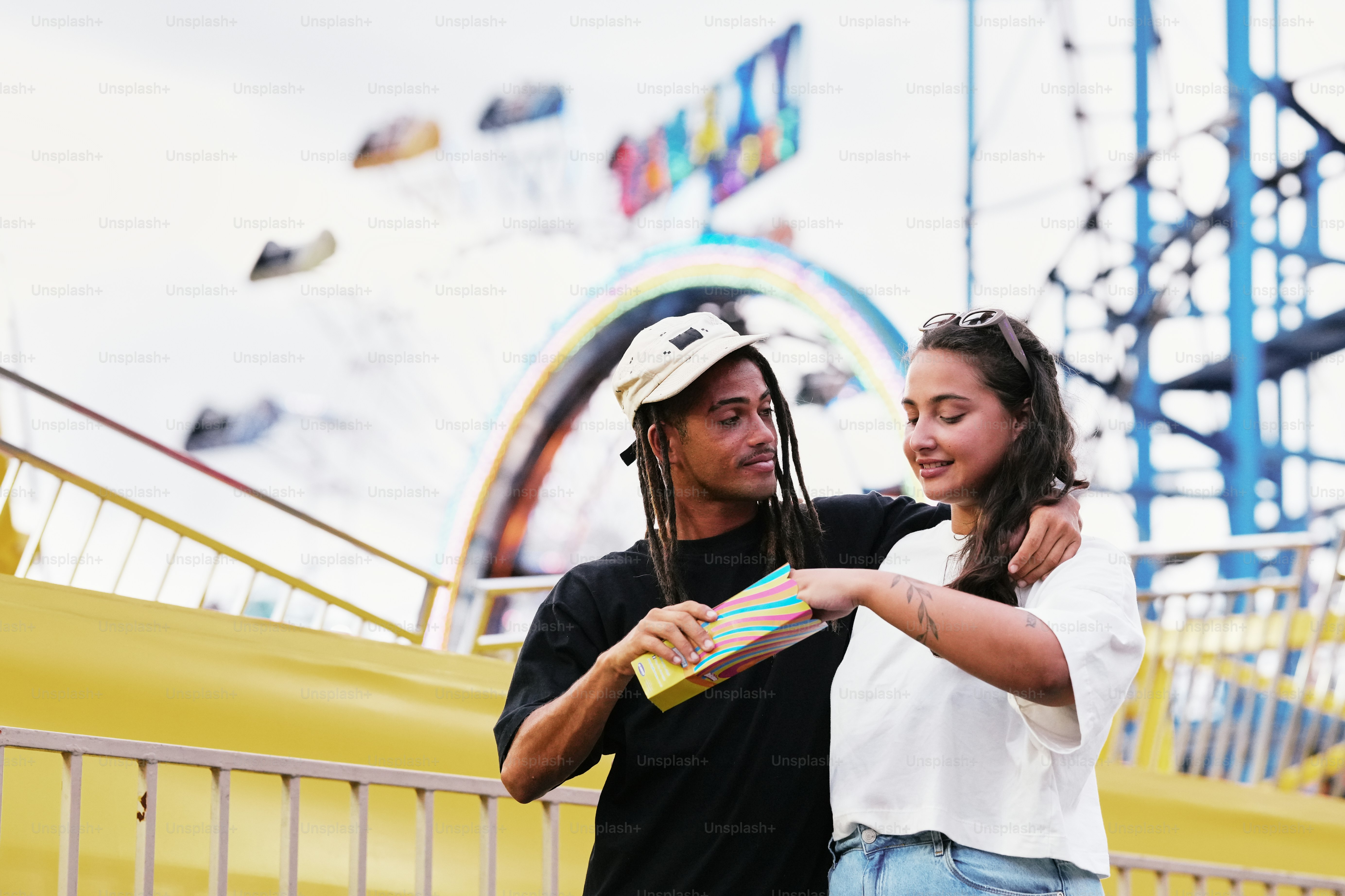 a man and a woman standing next to each other